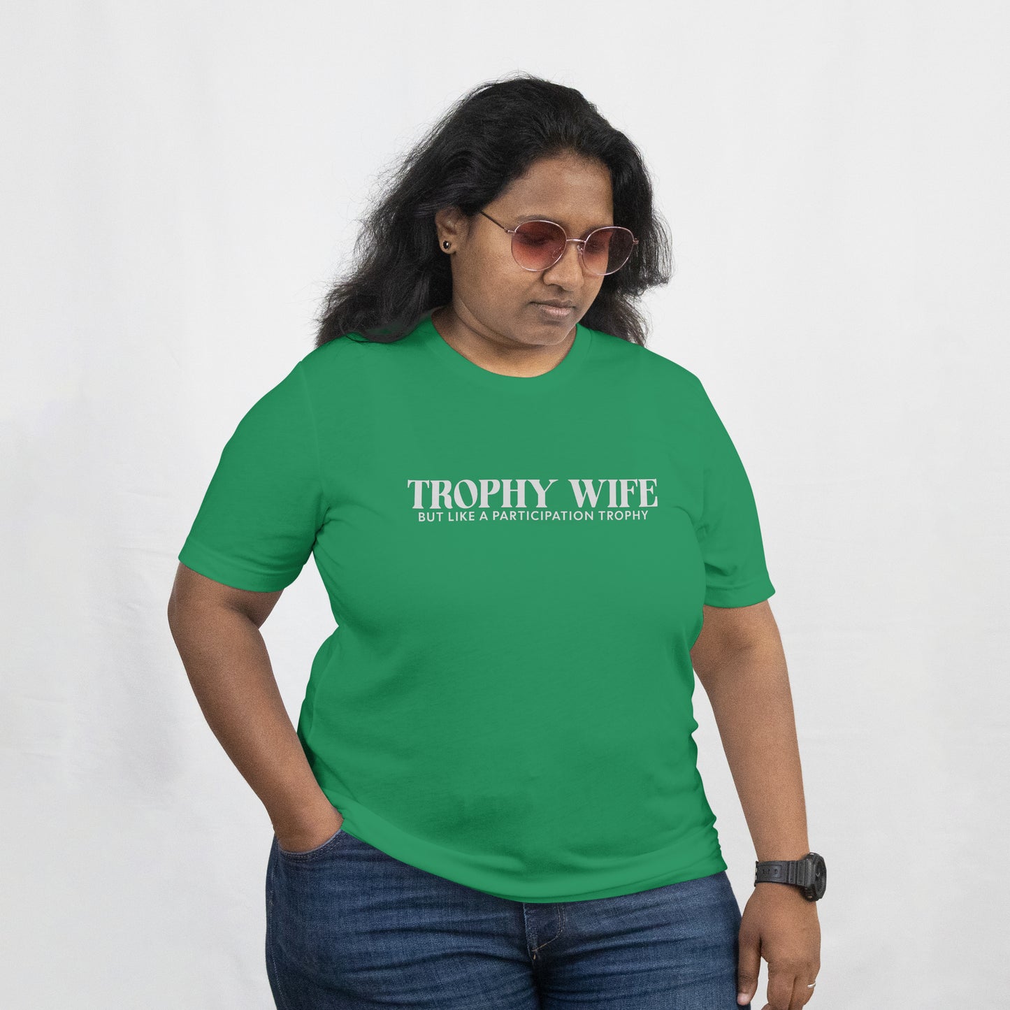 Person wearing a green t-shirt with text on a white background