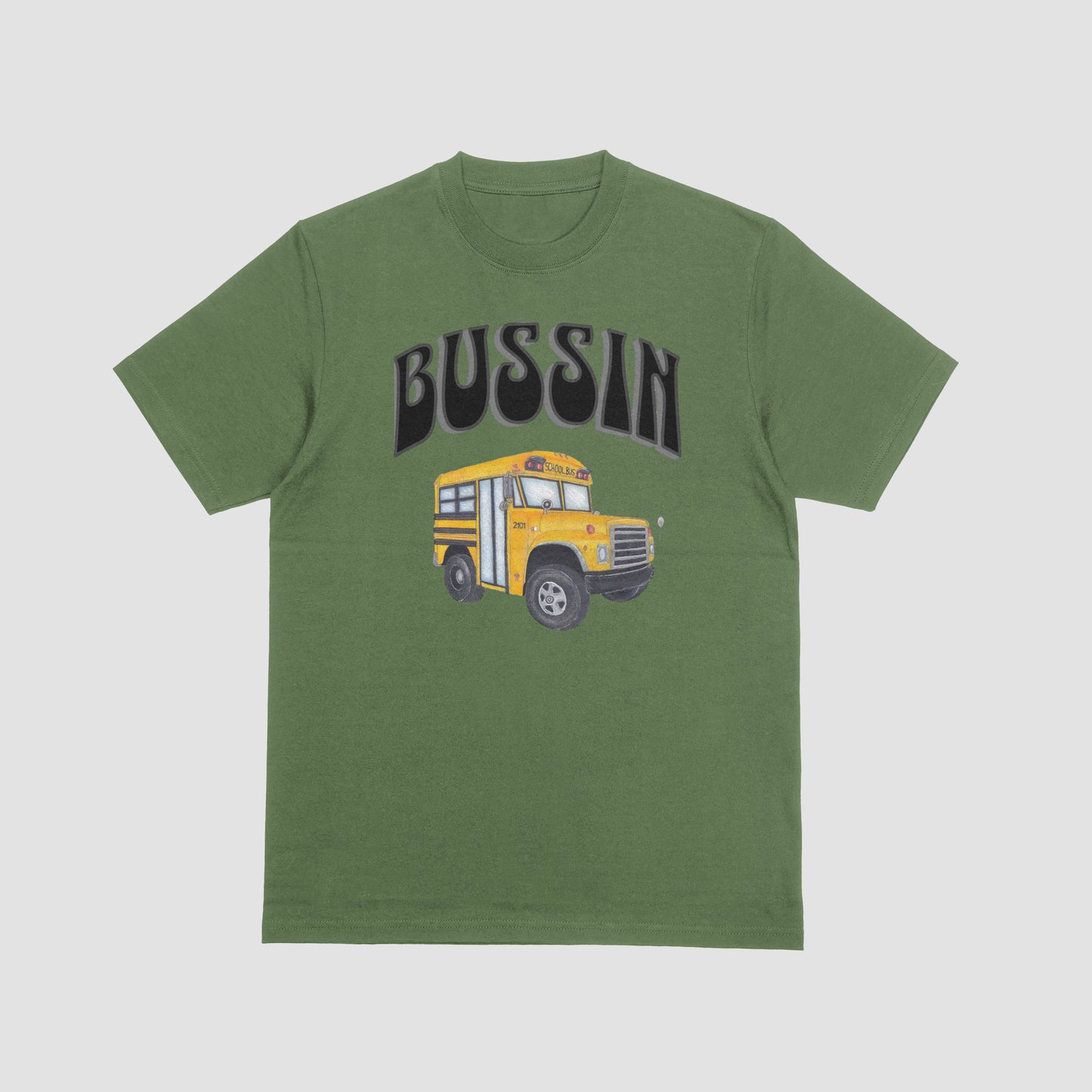 Green t-shirt with a yellow school bus graphic and 'BUSSIN' text on a light military green background