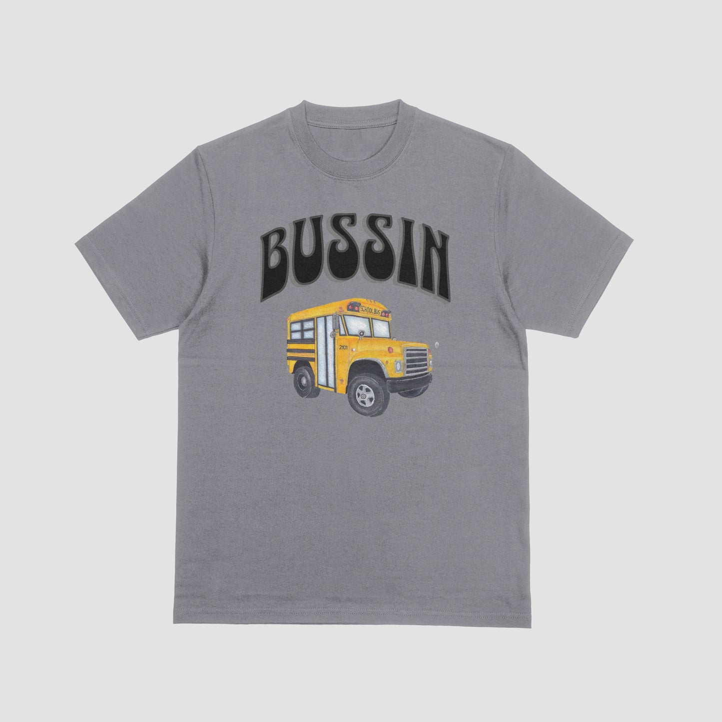 Gray t-shirt with a yellow school bus graphic and 'BUSSIN' text on a light gray background