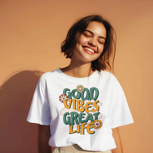 Model smiling wearing Good Vibes Great Life funny graphic tee by Mitten Hippie Apparel
