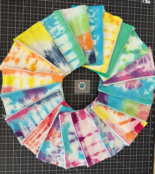 Blue and Yellow Tie Dye Travel Cosmetic Bag – Colorful Zip Pouch for Makeup & Essentials | Mitten Hippie