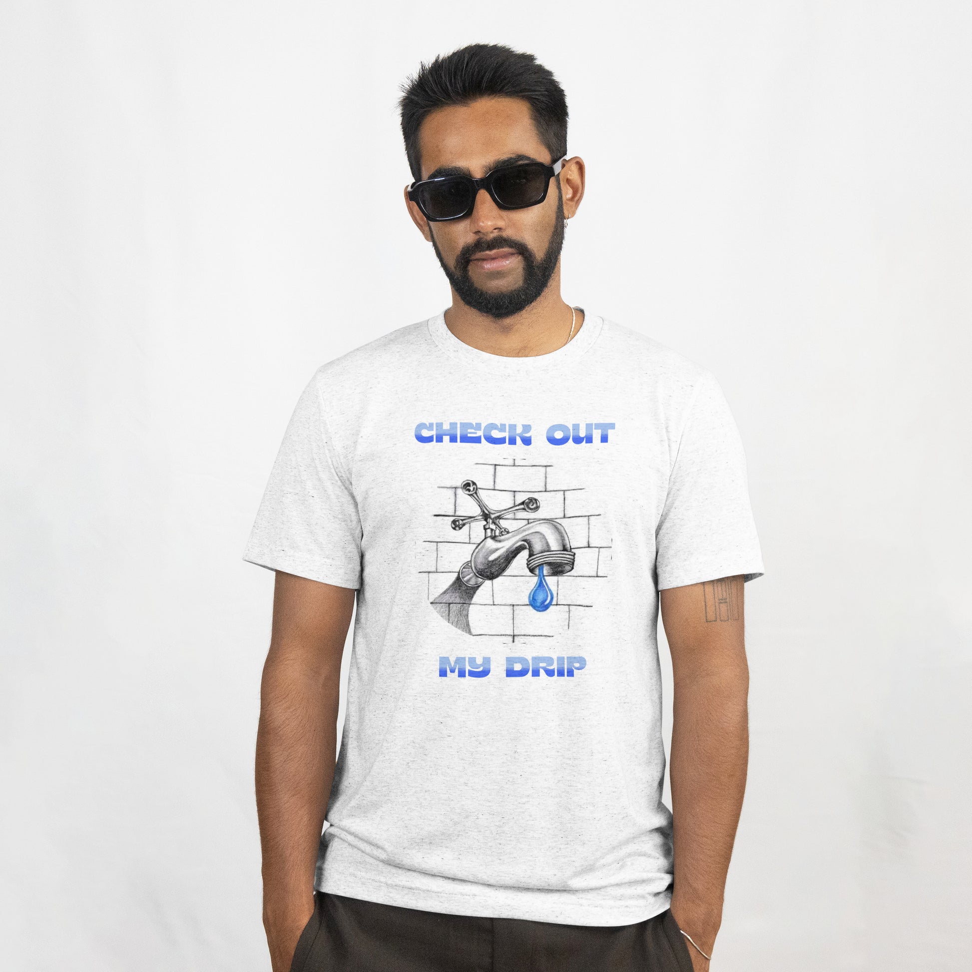 Male model wearing sunglasses and a white Check Out My Drip t-shirt against a white background